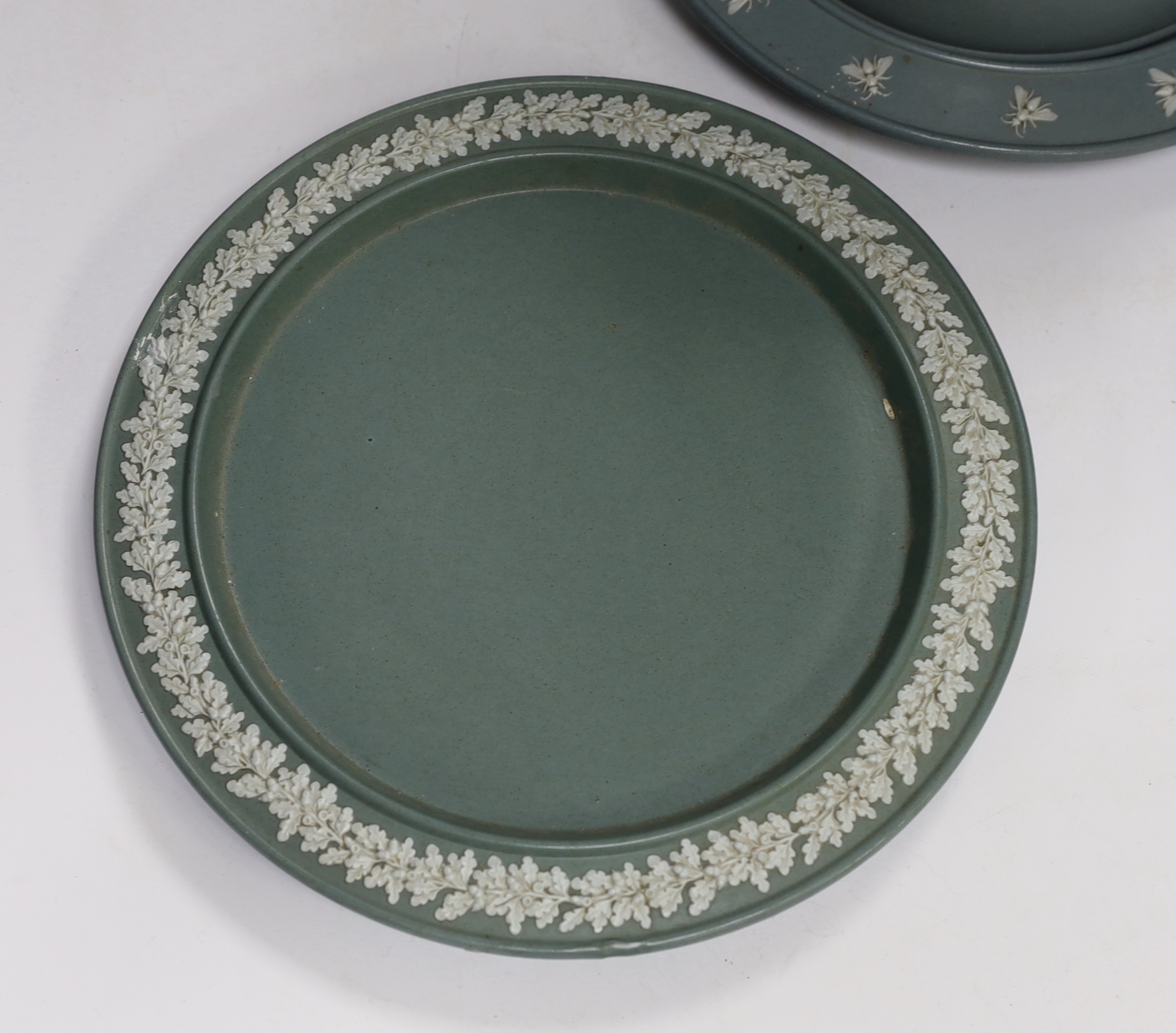 Two Victorian Dudson green glazed and white sprigged cheese dishes and covers, tallest 29cm